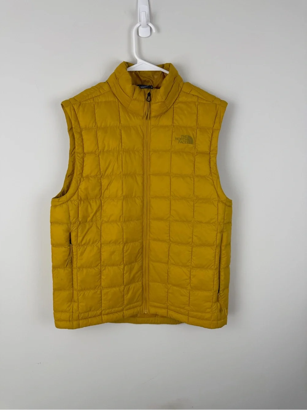 The North Face Men's Quilted Vest in Mustard Yellow